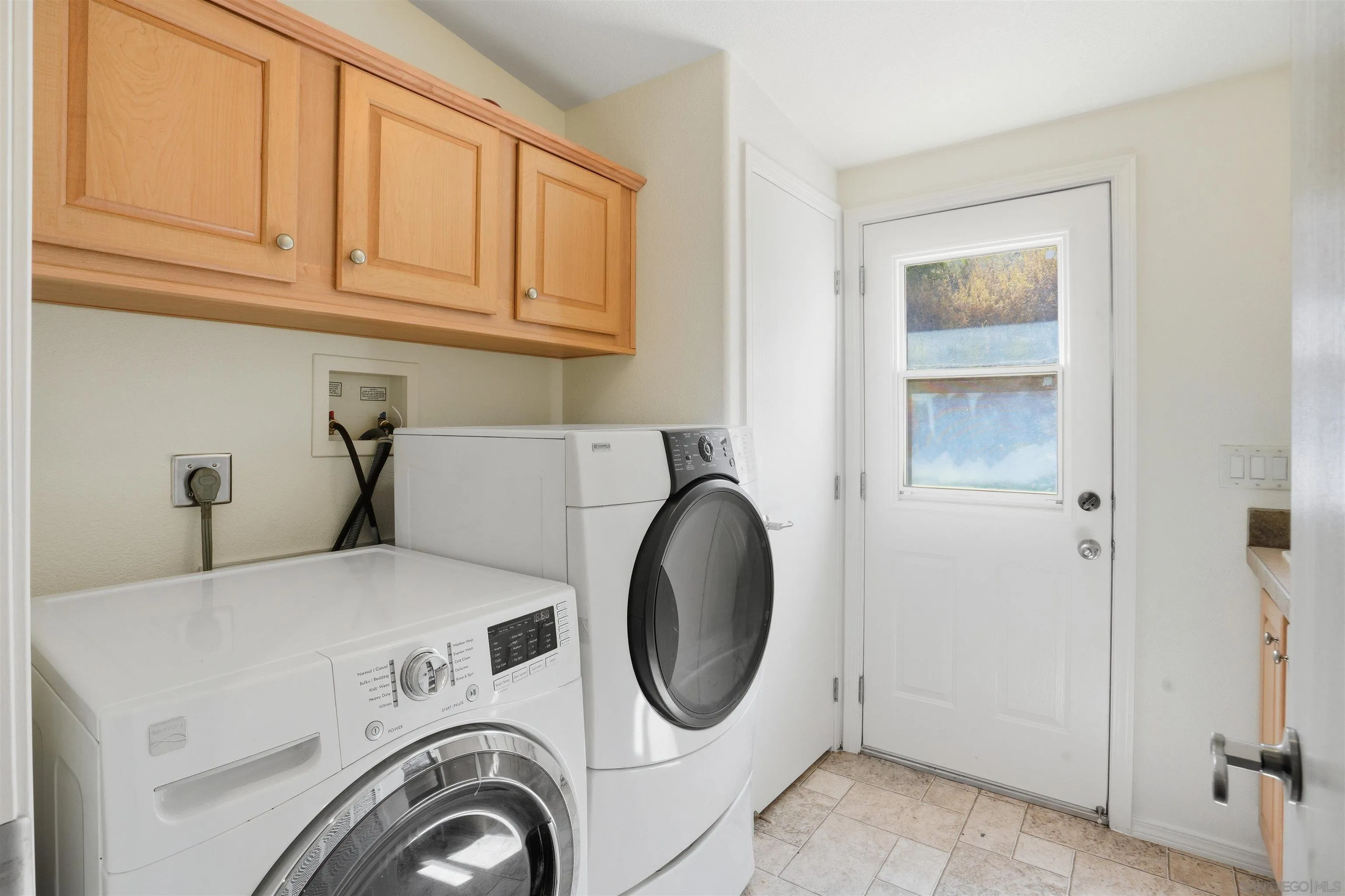 15453 Woods Valley Road Valley Center, CA 92082 - Photo 23 of 38 a utility room with dryer and washer