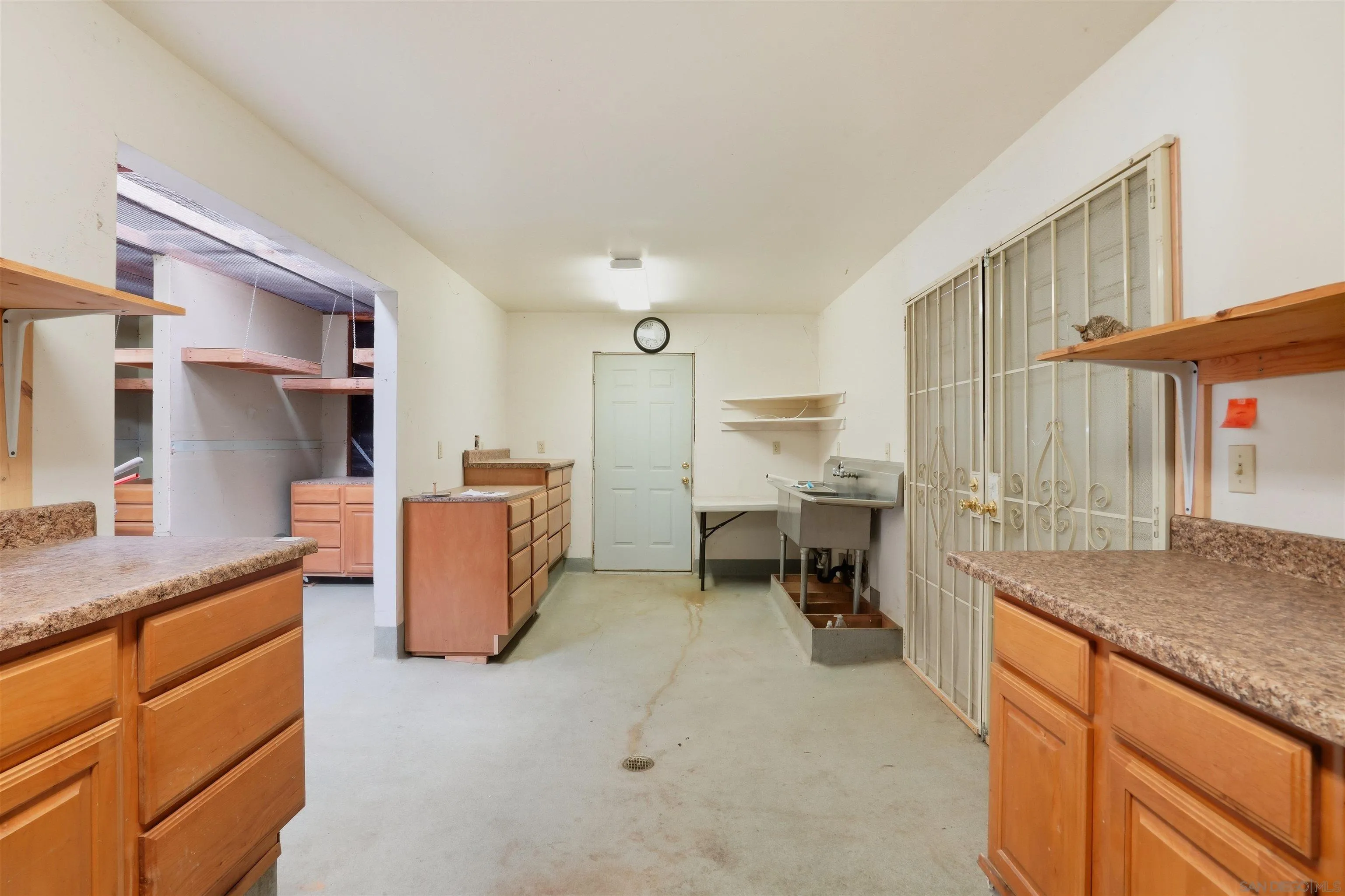 15453 Woods Valley Road Valley Center, CA 92082 - Photo 25 of 38 a room with furniture a washer and dryer