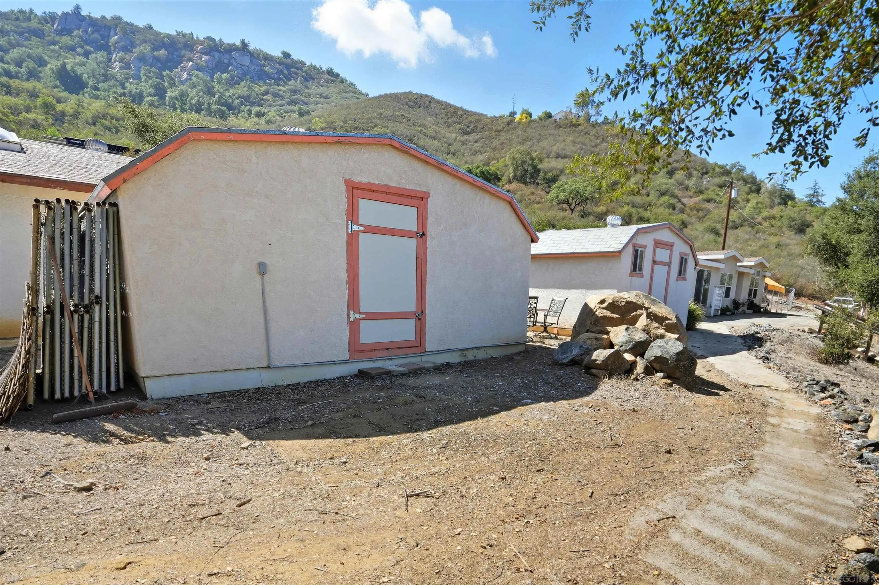 15453 Woods Valley Road Valley Center, CA 92082 - Photo 28 of 38 a view of a backyard of a house