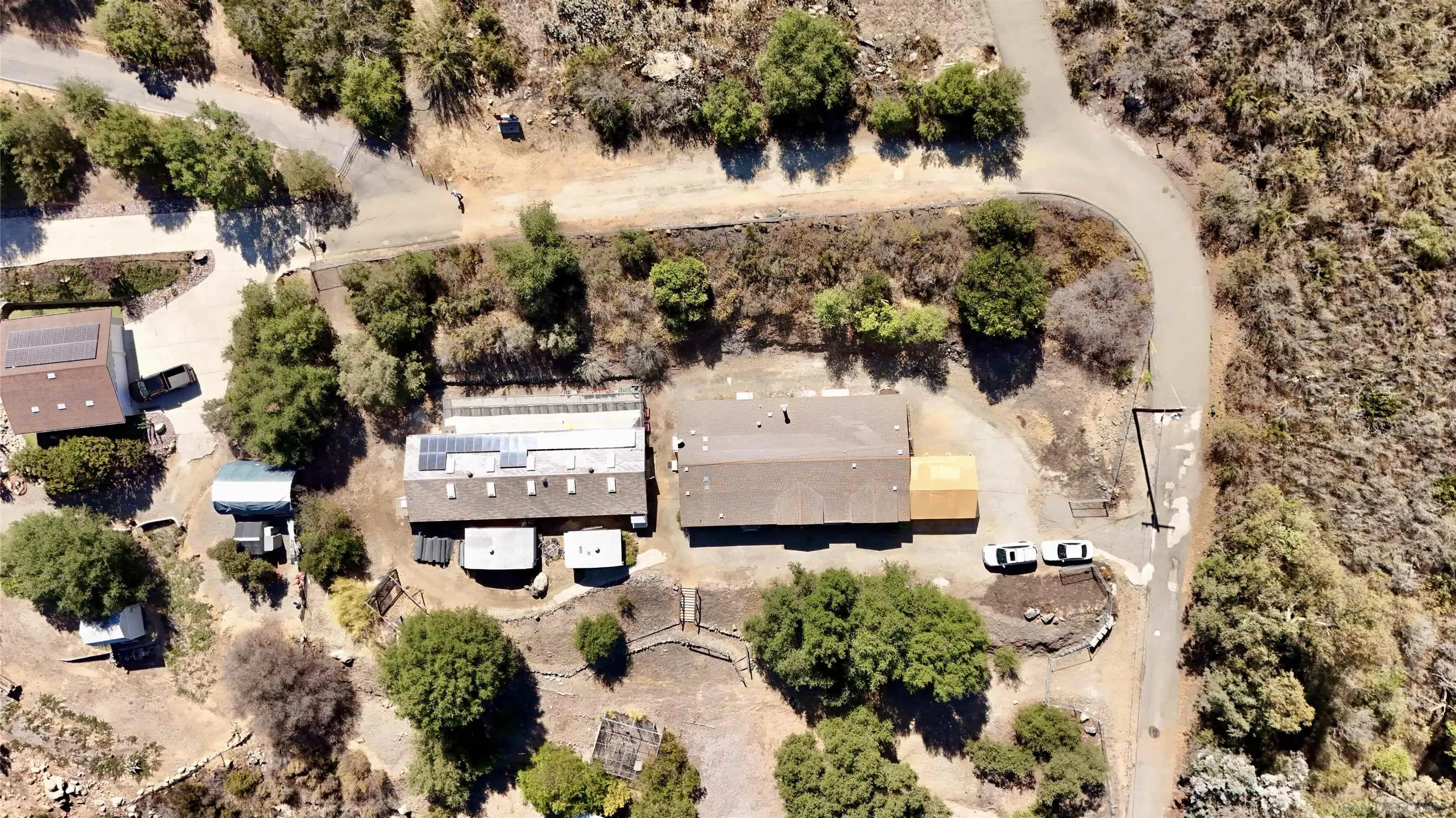 15453 Woods Valley Road Valley Center, CA 92082 - Photo 32 of 38 an aerial view of a house with a yard