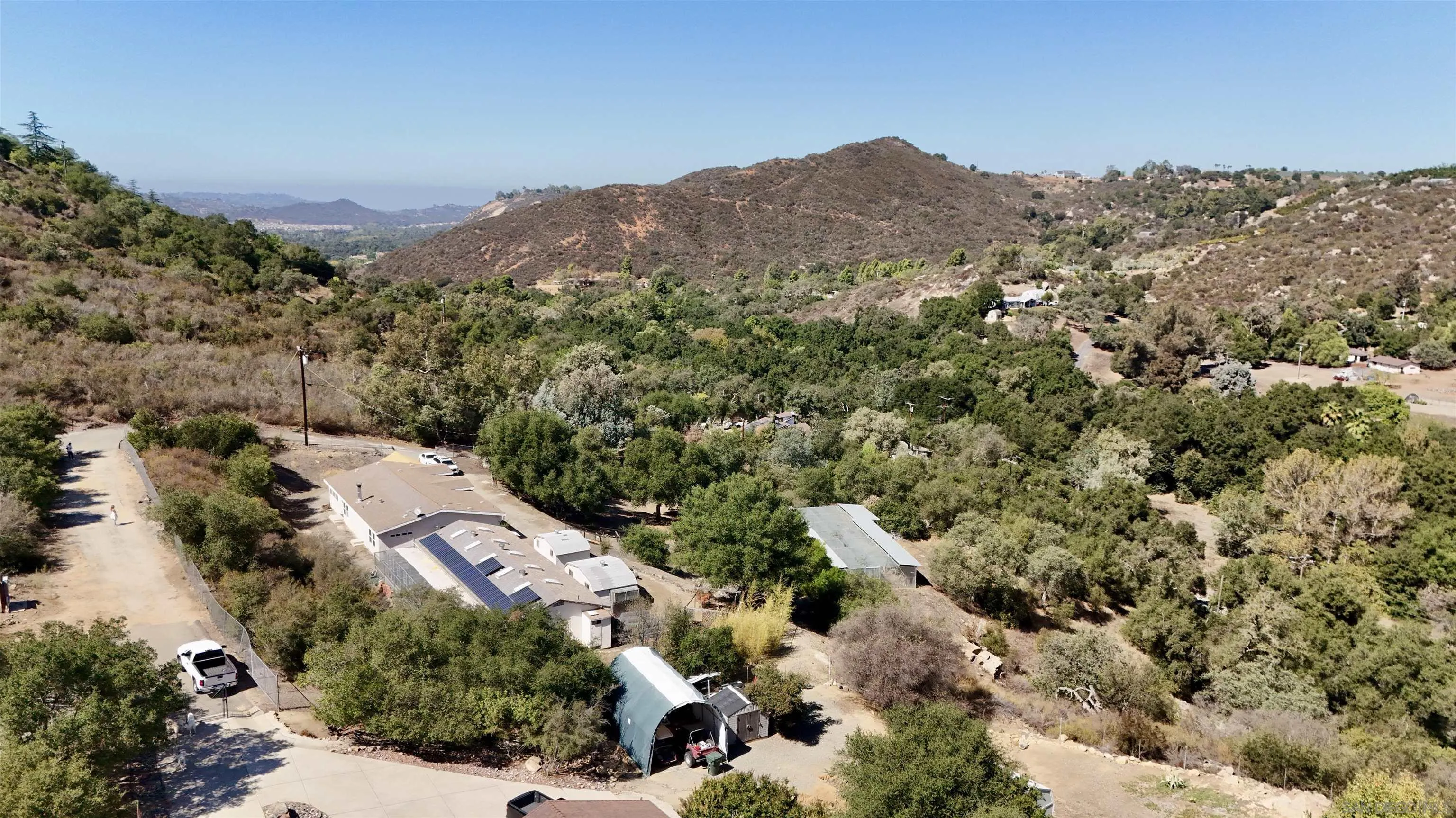15453 Woods Valley Road Valley Center, CA 92082 - Photo 36 of 38 an aerial view of house with a mountain