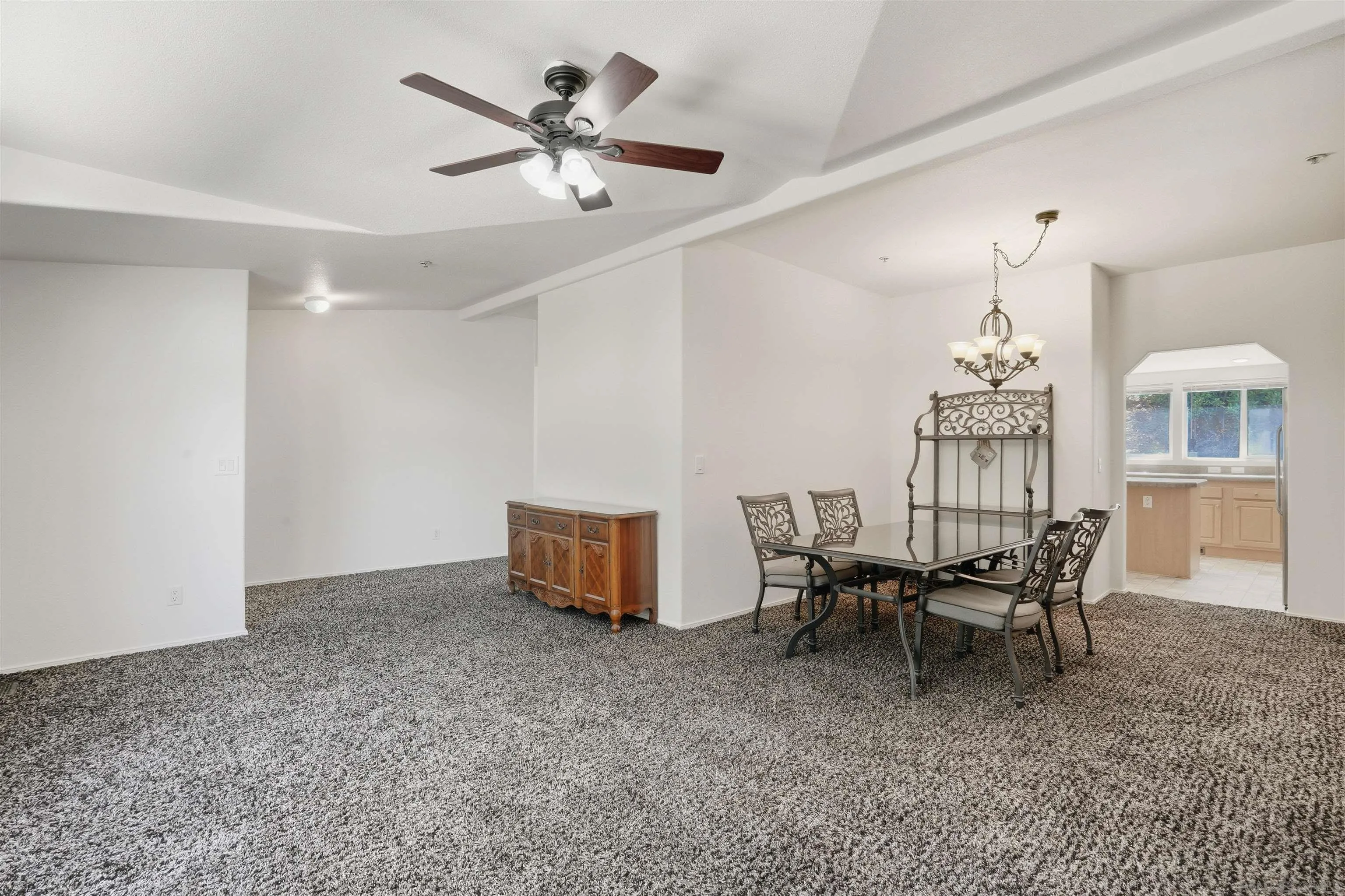 15453 Woods Valley Road Valley Center, CA 92082 - Photo 8 of 38 a view of a livingroom with furniture and chandelier fan