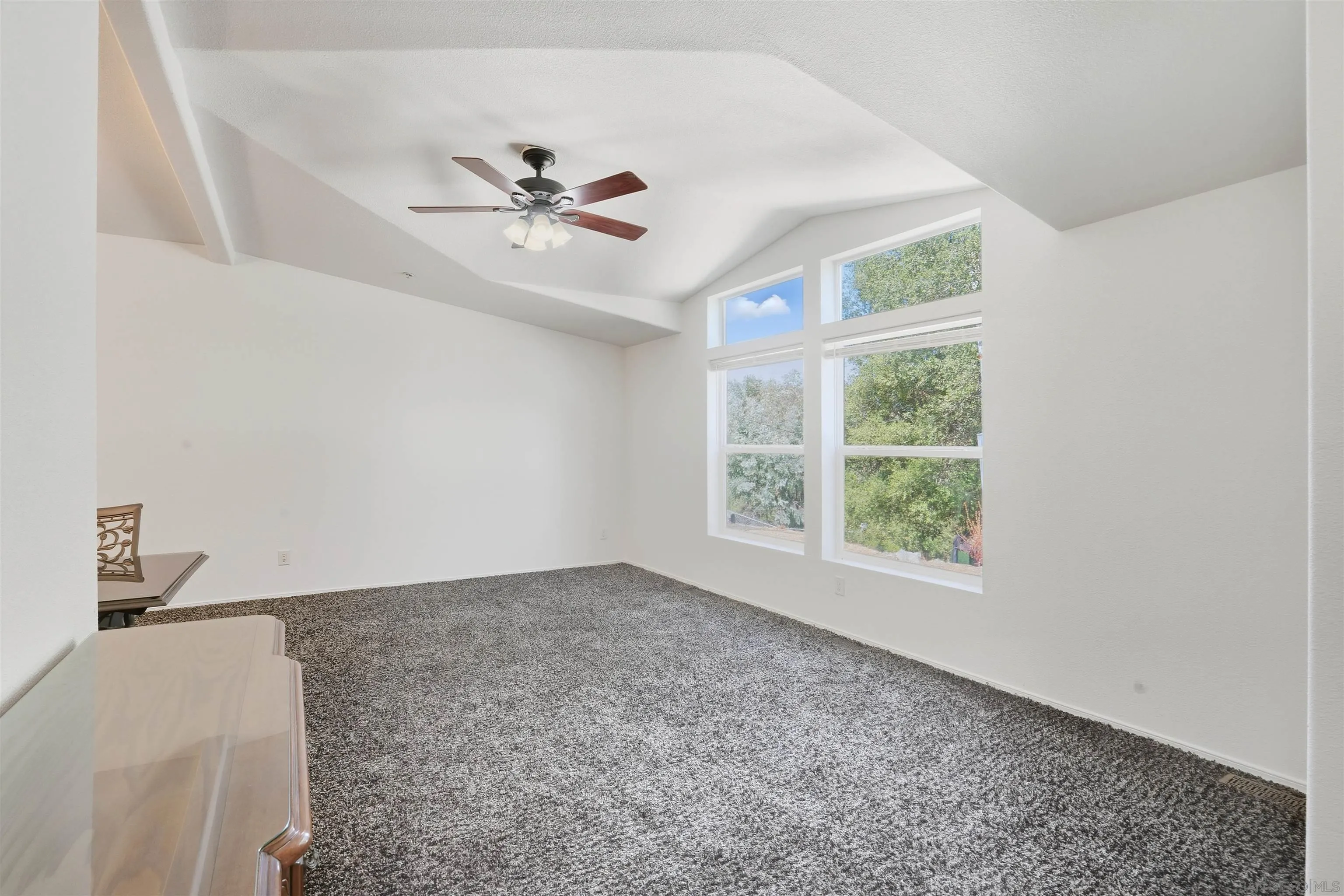 15453 Woods Valley Road Valley Center, CA 92082 - Photo 10 of 38 a view of an empty room with a window