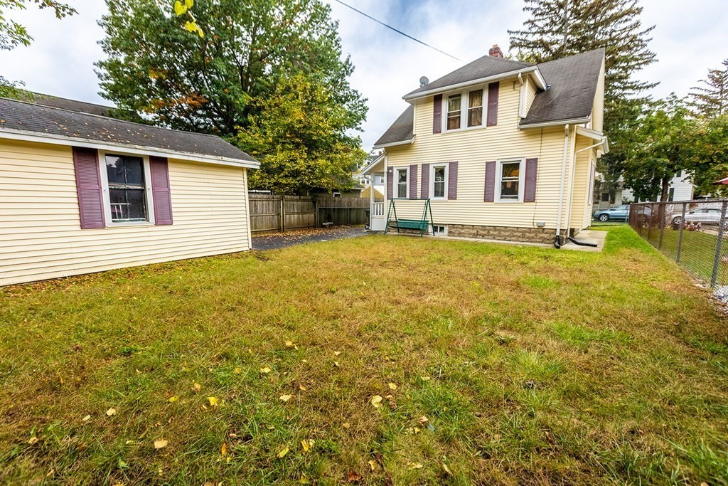 37 Alberta Street Springfield, MA 01108 - Photo 20 of 21 a view of a house with a yard and garage