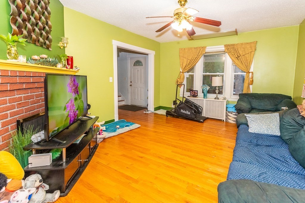 37 Alberta Street Springfield, MA 01108 - Photo 3 of 21 a bed room with a bed and a television