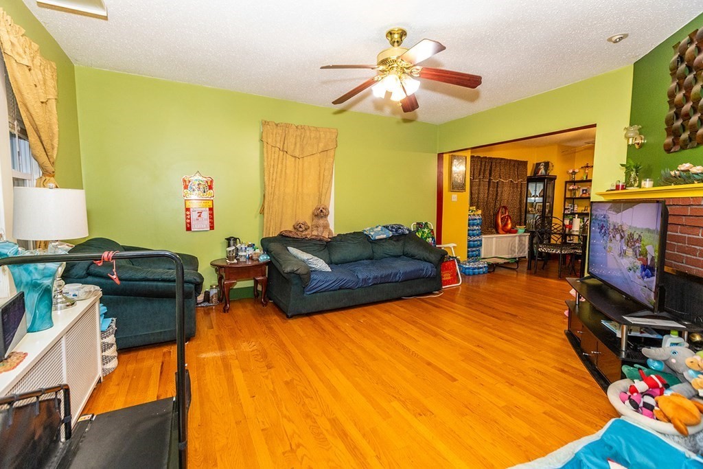 37 Alberta Street Springfield, MA 01108 - Photo 4 of 21 a living room with furniture and a flat screen tv