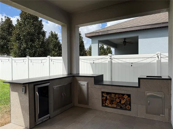 a view of a kitchen with a sink and dishwasher