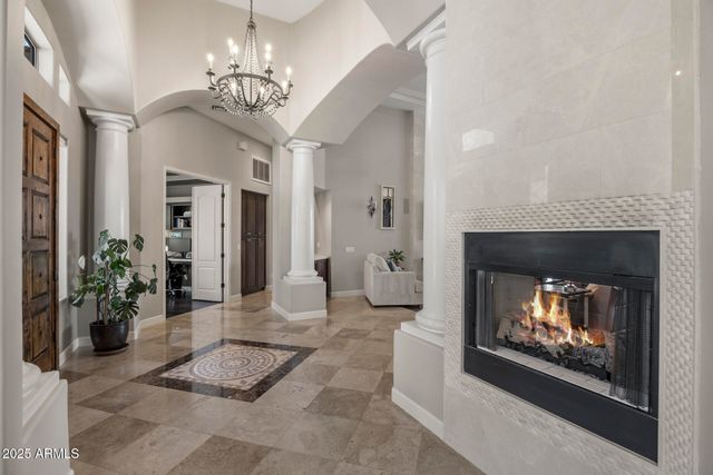 a view of a livingroom with furniture and a window