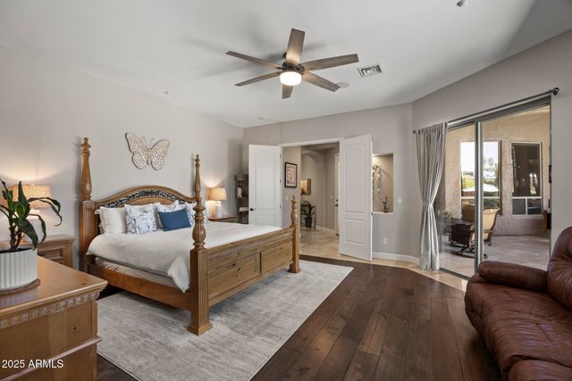 swimming pool view with a seating space and garden view