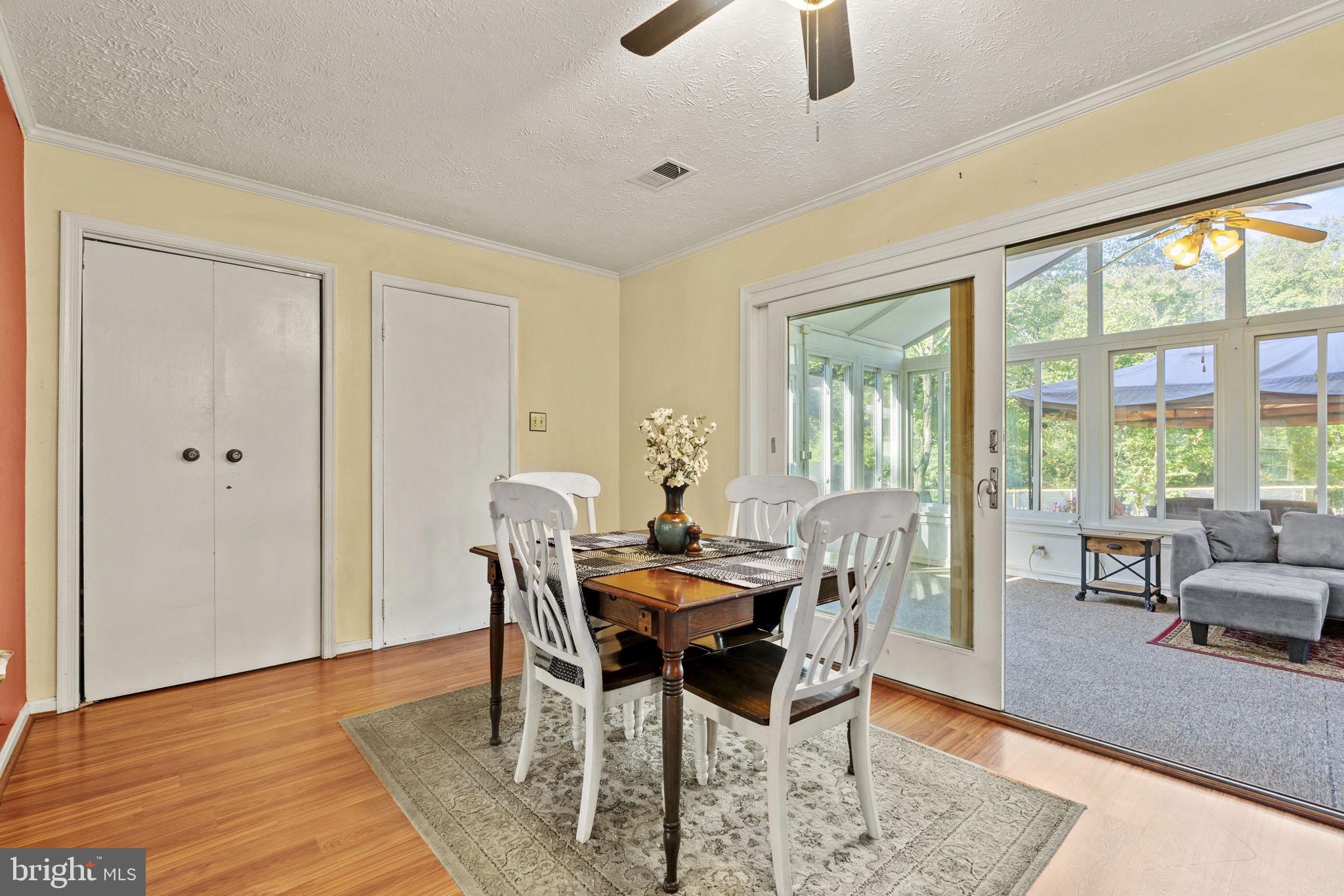 13012 Raintree Terrace Silver Spring, MD 20904 - Photo 10 of 24 Dining area leads to sun room