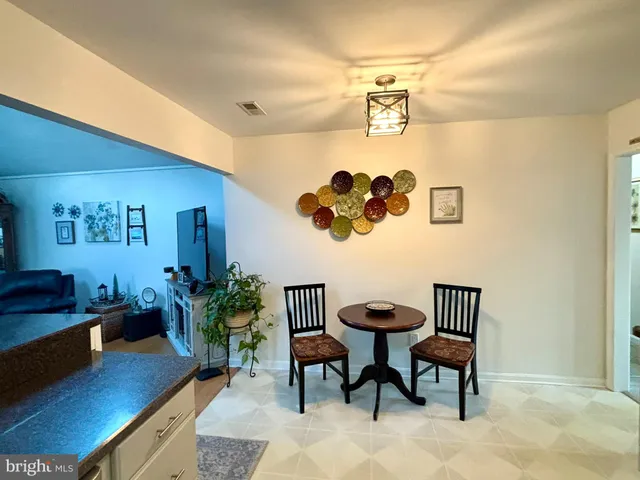 a view of a livingroom with furniture and rug