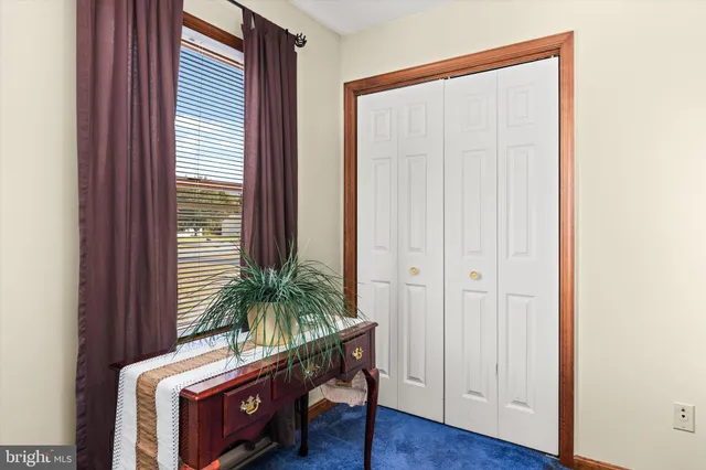 a room with window and wooden floor