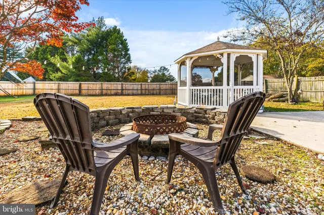 a view of a swimming pool with a lounge chair