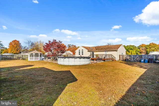 a view of a swimming pool with an ocean view