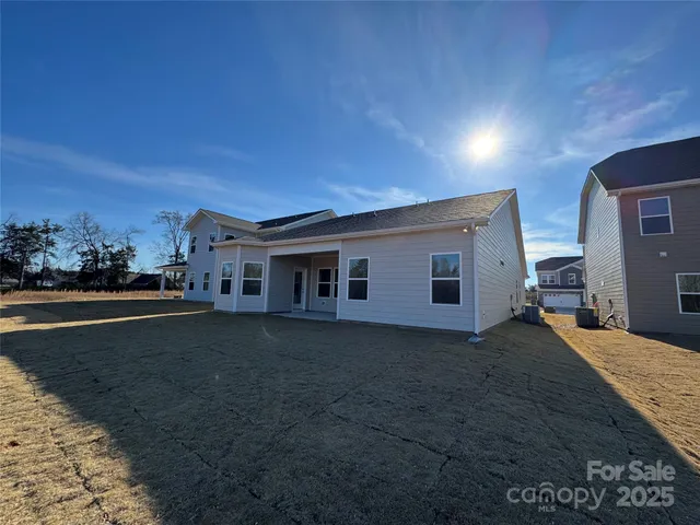 a house view with a backyard space