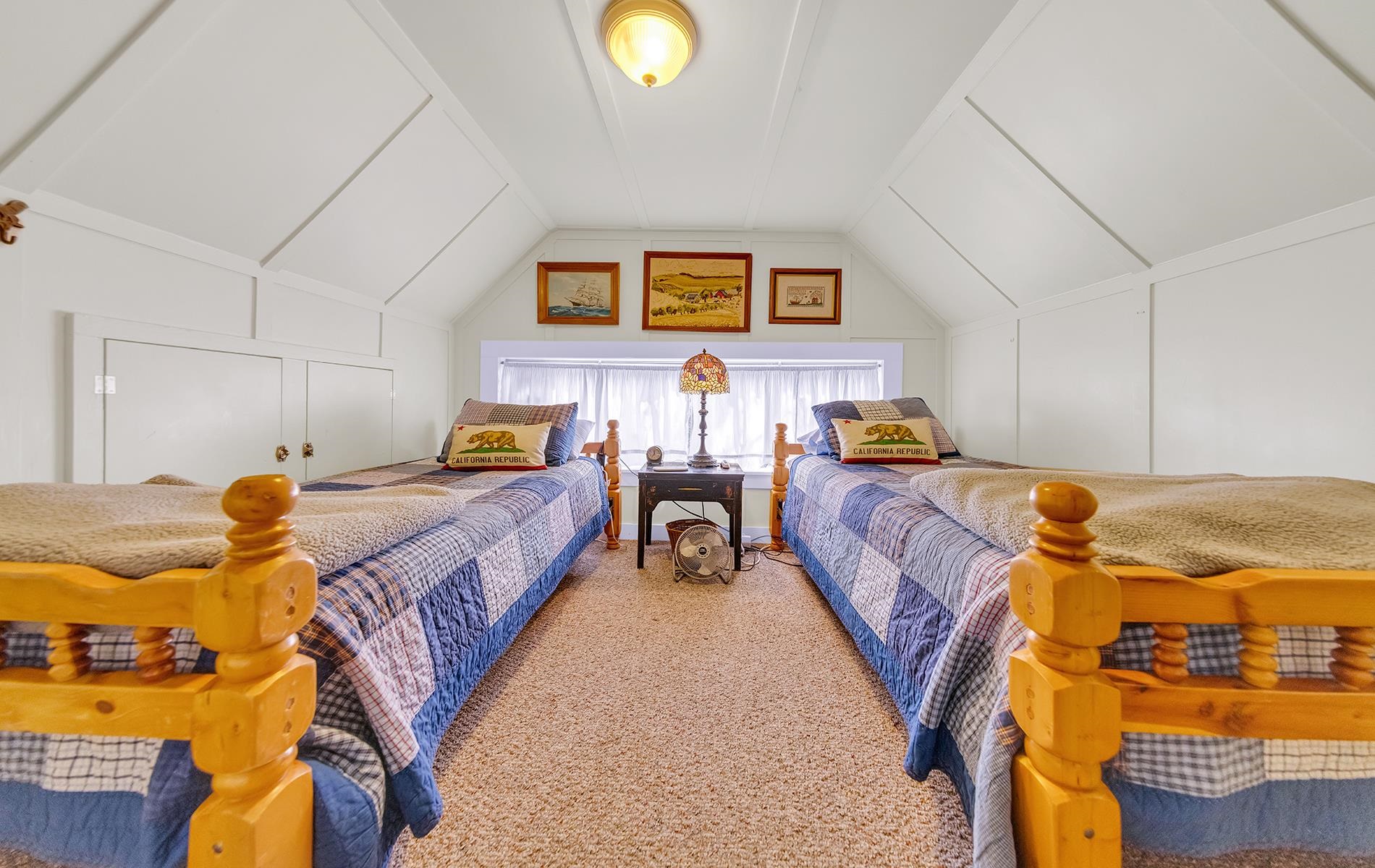 167 Stover Road Chester, CA 96020 - Photo 21 of 33 a bed room with two bed and a lamp