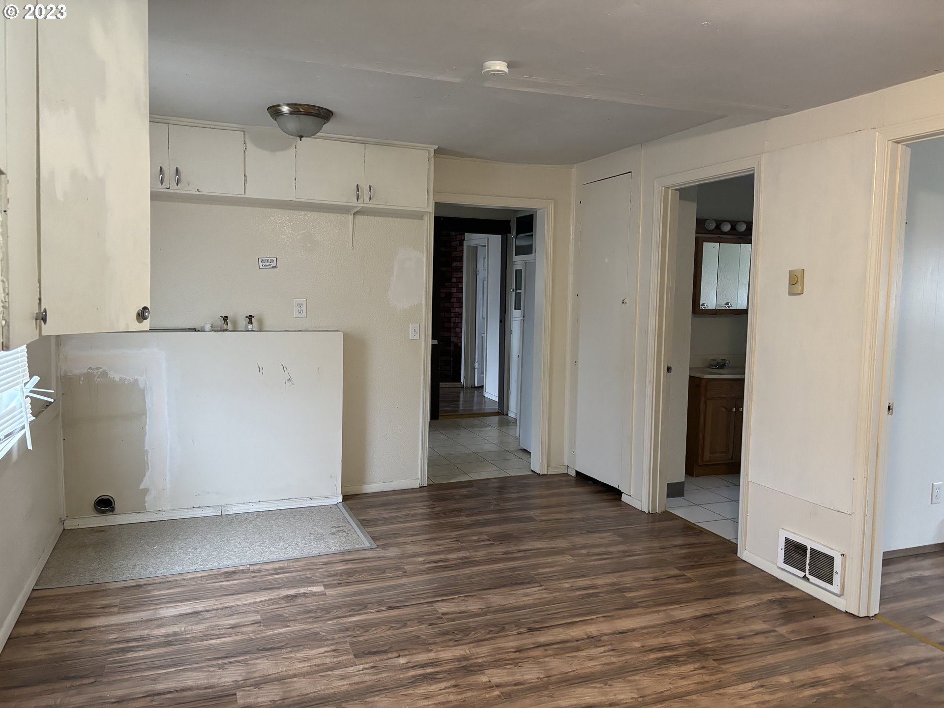 707 Southwest 15th Street Pendleton, OR 97801 - Photo 12 of 20 a view of a kitchen with wooden floor