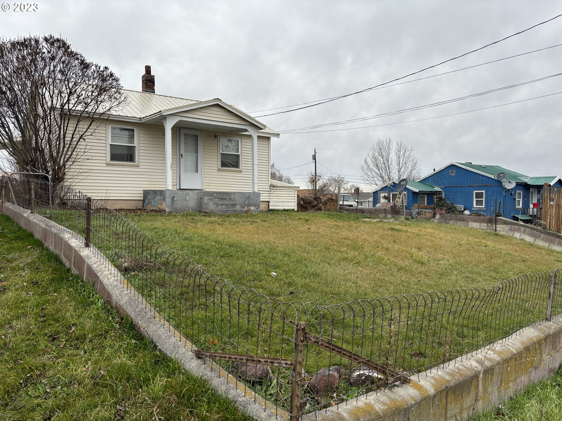 707 Southwest 15th Street Pendleton, OR 97801 - Photo 2 of 20 a view of a house with a big yard and large trees
