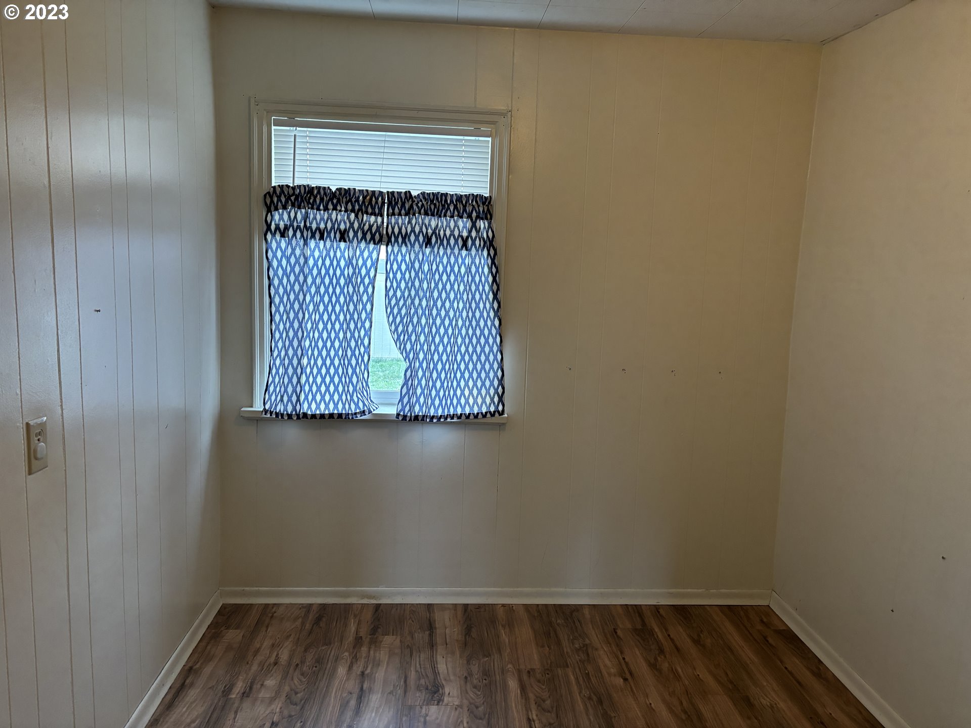 707 Southwest 15th Street Pendleton, OR 97801 - Photo 8 of 20 a view of a small space with wooden floor and a window