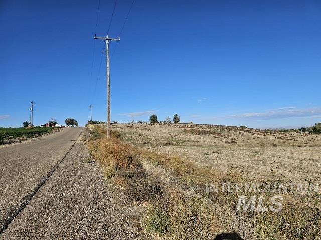 Tbd Fairview Avenue Fruitland, ID 83619 - Photo 3 of 17 View of asphalt road featuring a view of rural / pastoral area
