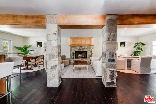 a room with furniture and a wooden floor