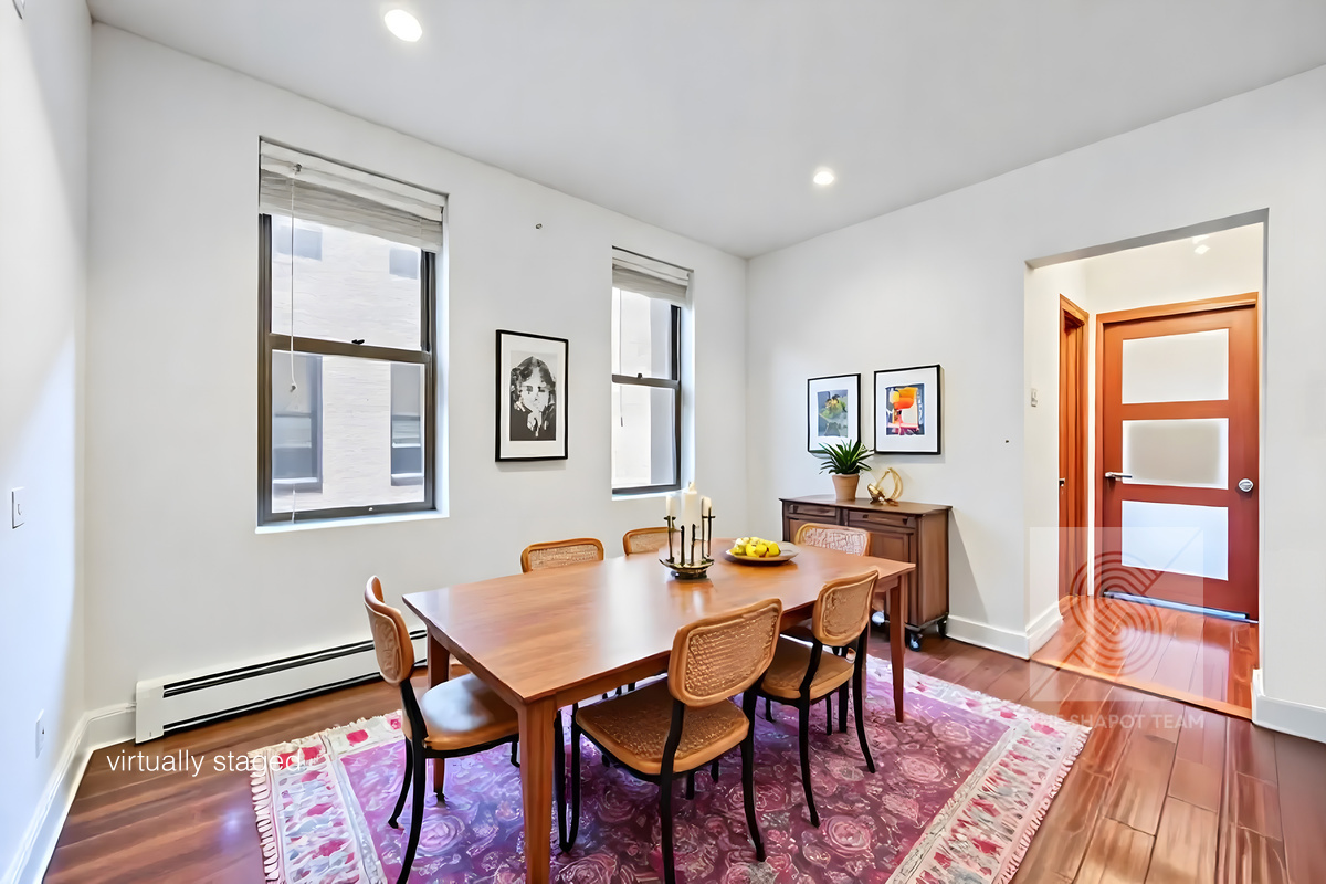 807 Riverside Drive, Unit 3A Manhattan, NY 10032 - Photo 2 of 8 a dining room with furniture and wooden floor