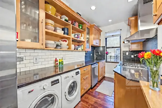 a utility room with dryer and washer