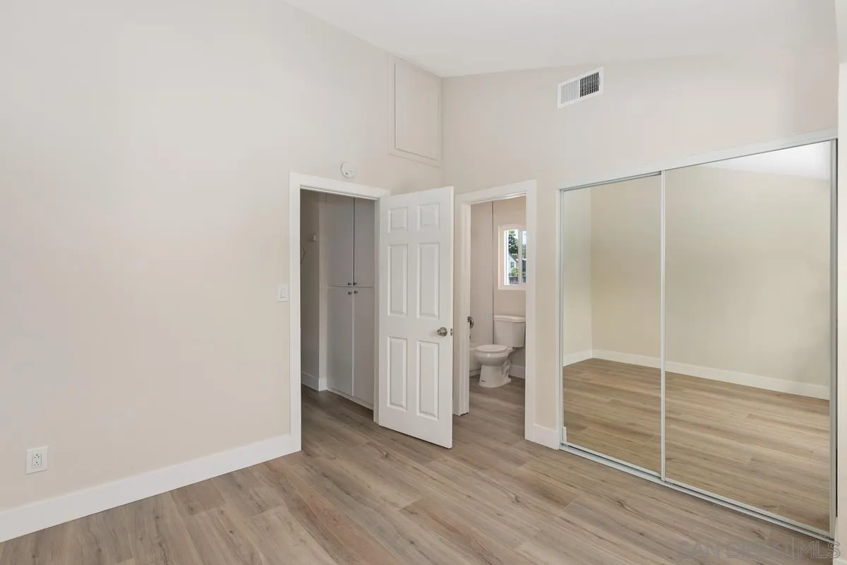 2301 Kings View Circle Spring Valley, CA 91977 - Photo 21 of 26 a view of empty room with wooden floor