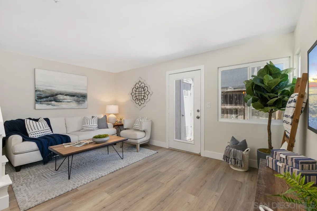 2301 Kings View Circle Spring Valley, CA 91977 - Photo 4 of 26 a living room with furniture and a potted plant