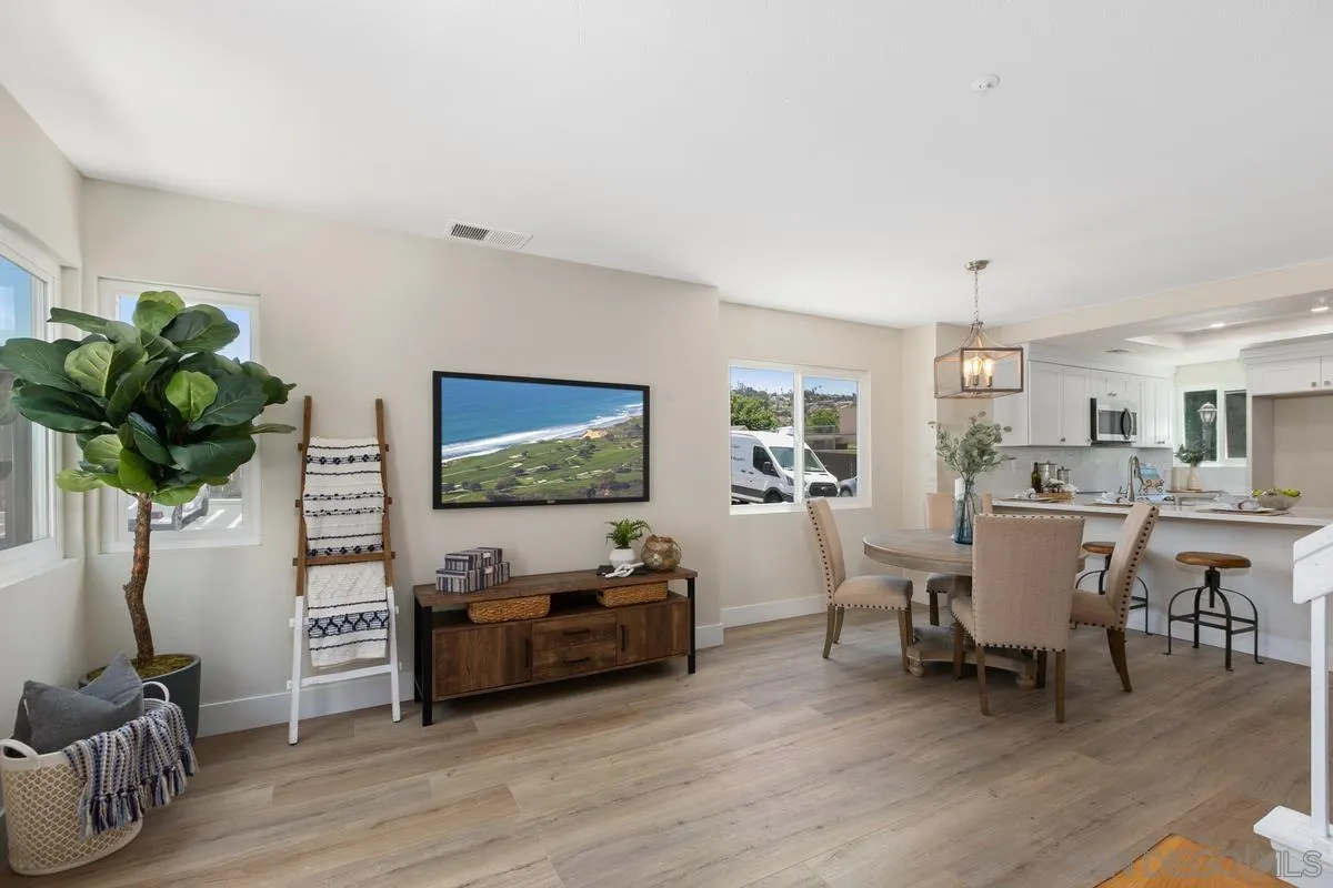 2301 Kings View Circle Spring Valley, CA 91977 - Photo 7 of 26 a living room with furniture and a flat screen tv