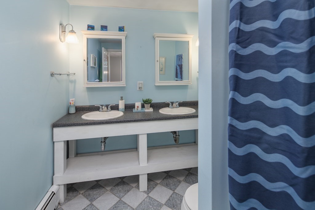 170 Haverhill Road Topsfield, MA 01983 - Photo 20 of 31 a bathroom with a sink and a mirror
