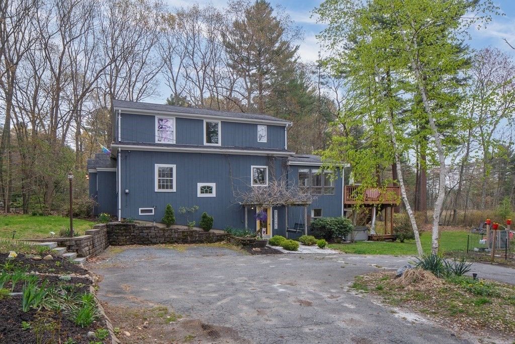 170 Haverhill Road Topsfield, MA 01983 - Photo 31 of 31 a front view of a house with a yard and tree s
