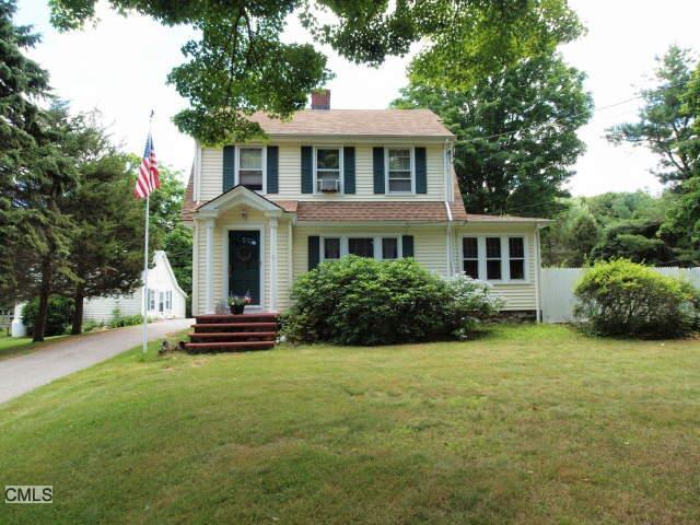 421 Walnut Tree Hill Road Shelton, CT 06484 - Photo 1 of 1 a front view of a house with a garden