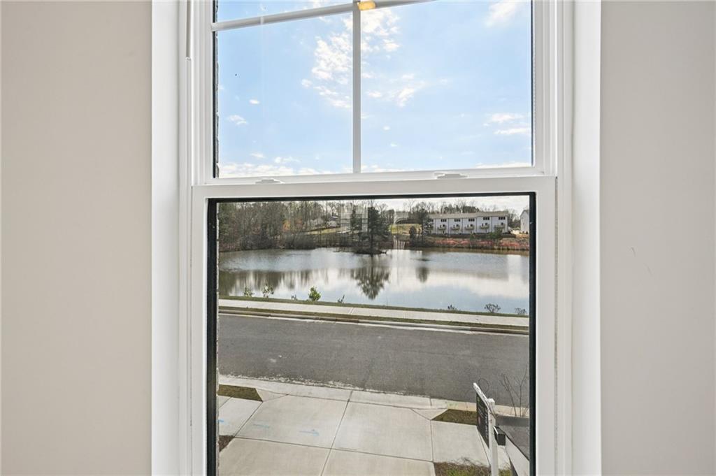 216 Wilder Ridge Way Lawrenceville, GA 30044 - Photo 17 of 46 a room with a window