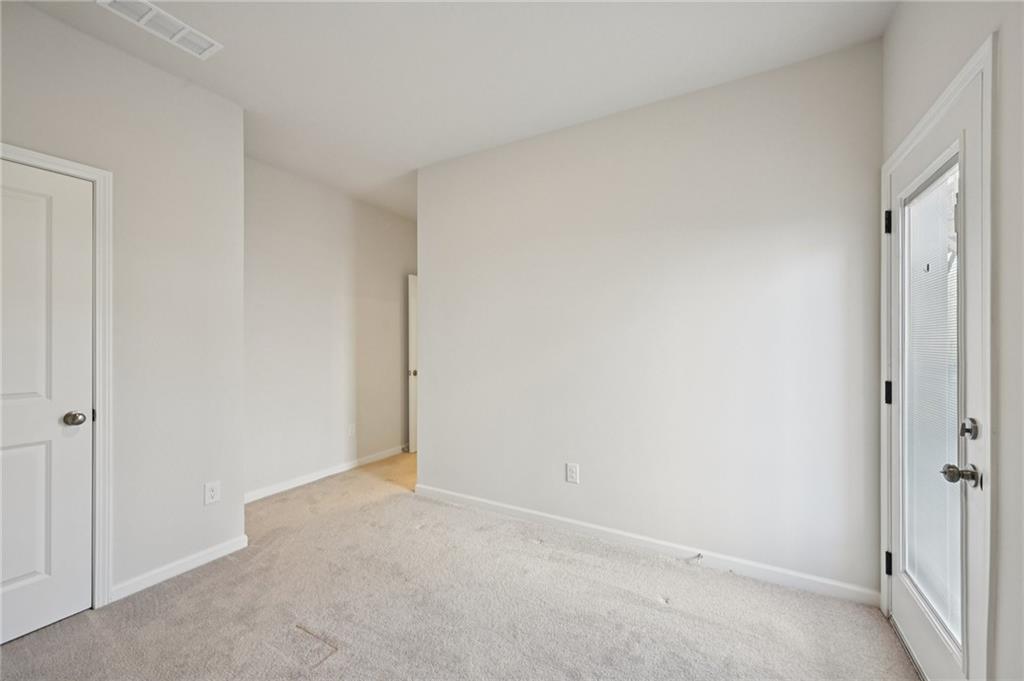 216 Wilder Ridge Way Lawrenceville, GA 30044 - Photo 18 of 46 a view of an empty room