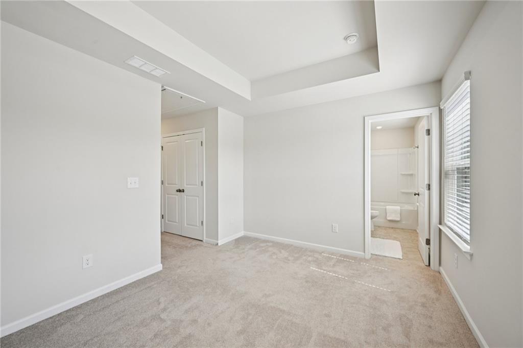 216 Wilder Ridge Way Lawrenceville, GA 30044 - Photo 24 of 46 wooden floor and closet in a room