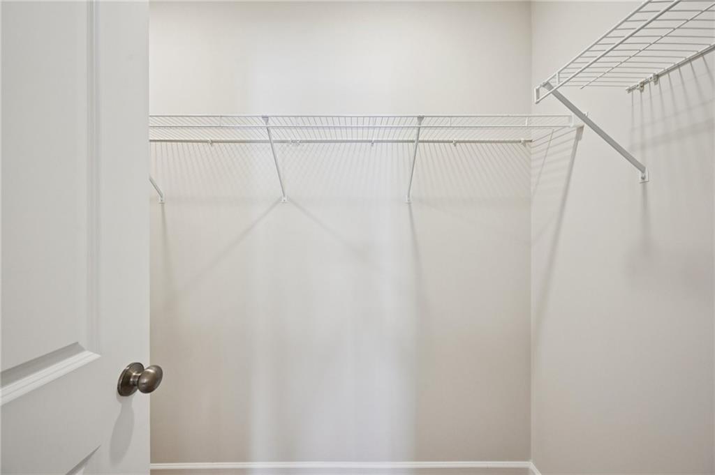 216 Wilder Ridge Way Lawrenceville, GA 30044 - Photo 28 of 46 a bathroom with a shower