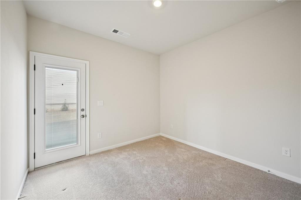 216 Wilder Ridge Way Lawrenceville, GA 30044 - Photo 32 of 46 a view of an empty room