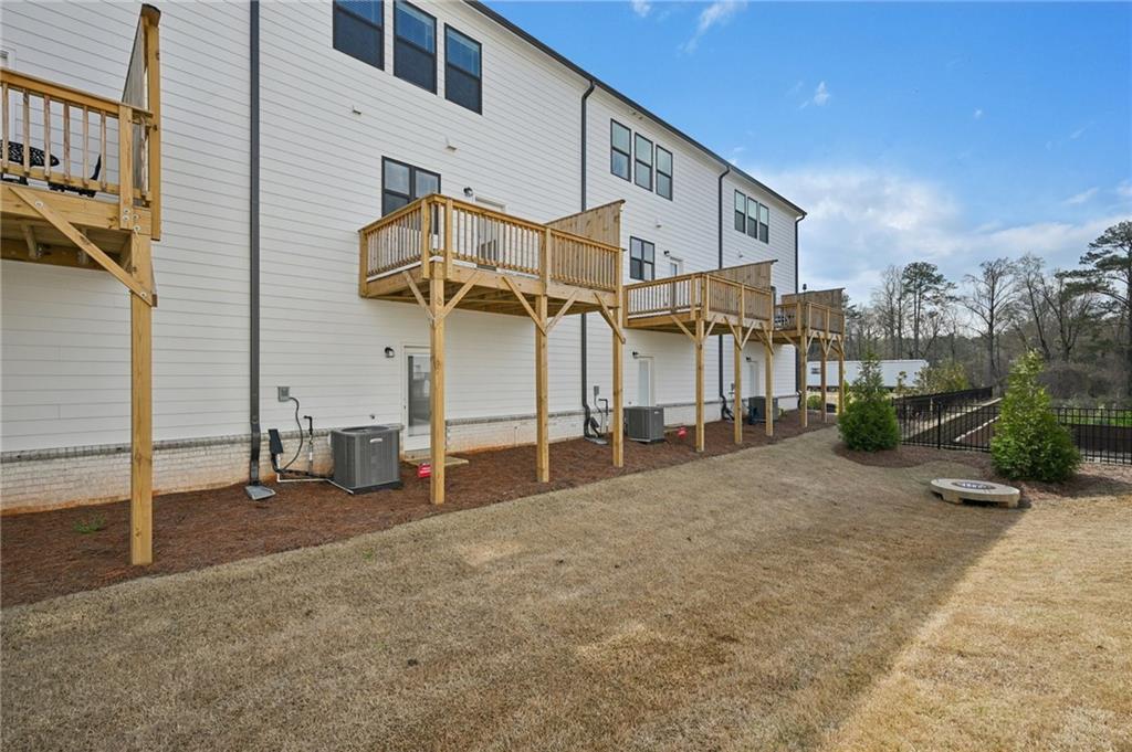 216 Wilder Ridge Way Lawrenceville, GA 30044 - Photo 37 of 46 a view of a house with a patio