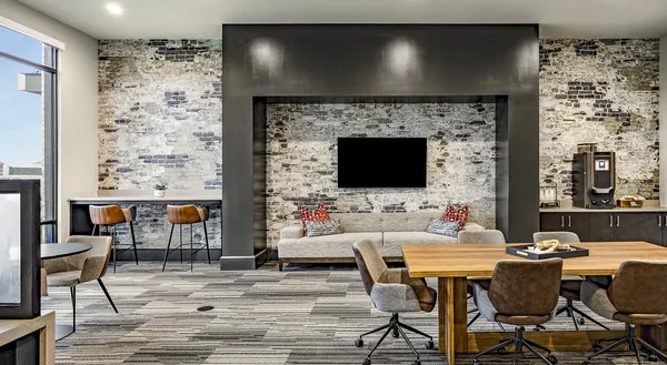 a view of a livingroom with furniture and a fireplace