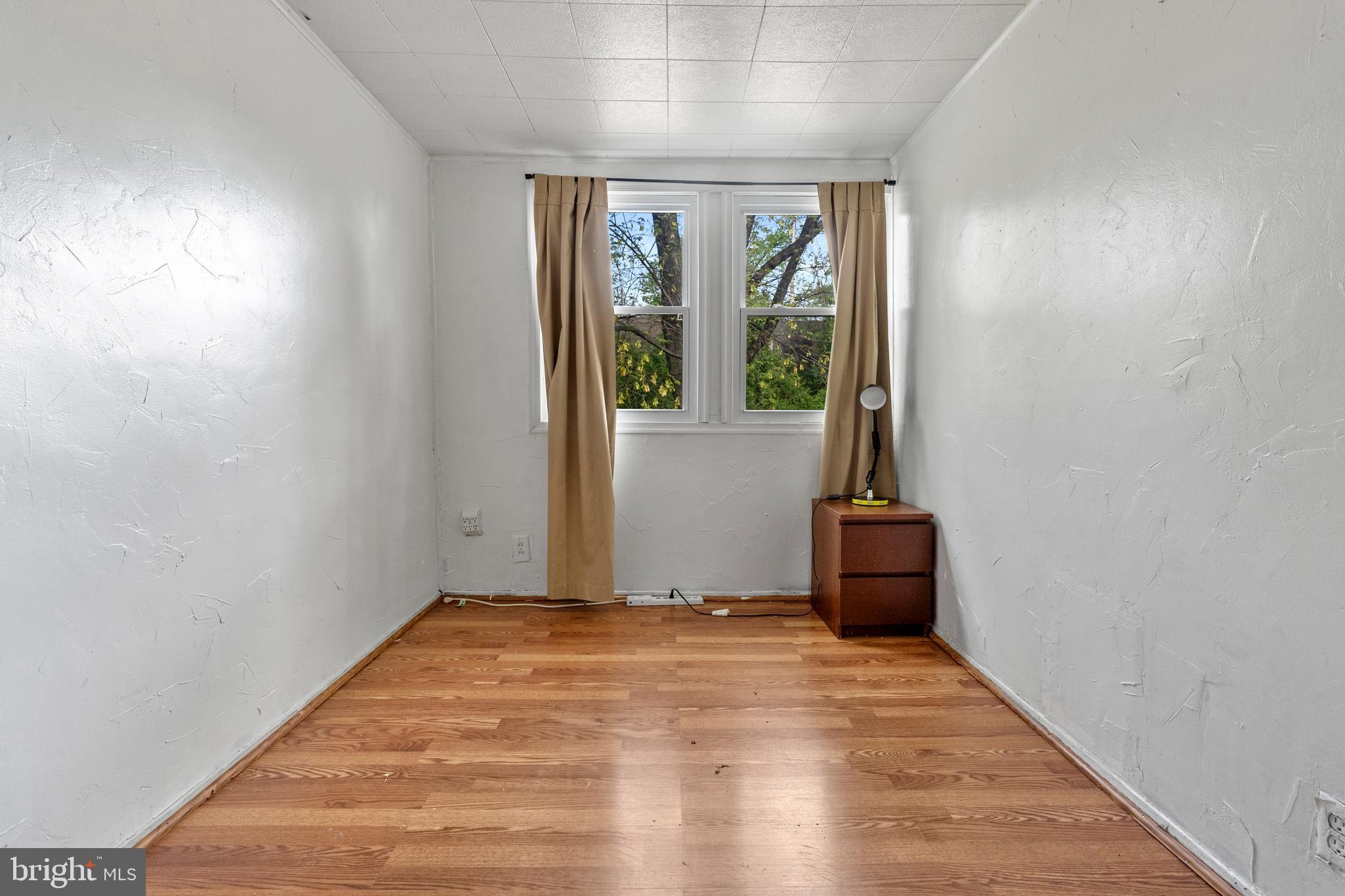 3031 Freeway Halethorpe, MD 21227 - Photo 15 of 25 wooden floor in an empty room with a window