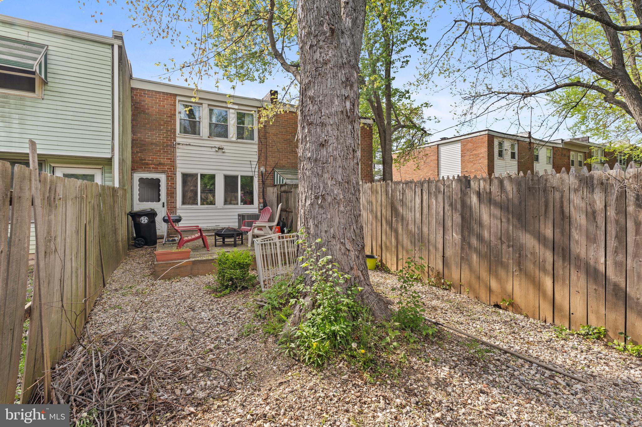 3031 Freeway Halethorpe, MD 21227 - Photo 21 of 25 a backyard of a house with yard and outdoor seating