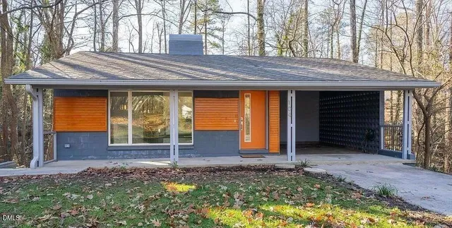 a house view with a backyard space