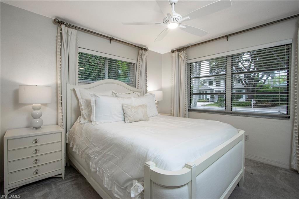 359 2nd Avenue North Naples, FL 34102 - Photo 20 of 41 a bedroom with a bed and a window
