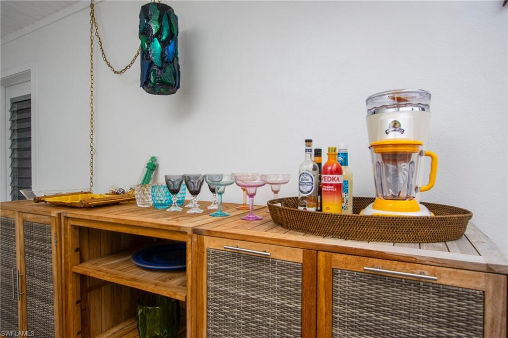 359 2nd Avenue North Naples, FL 34102 - Photo 35 of 41 a dining room with a table and chairs