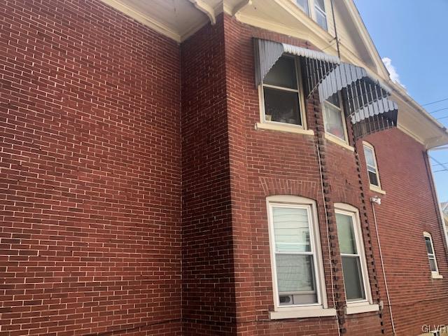 224 East Goepp Street Bethlehem, PA 18018 - Photo 8 of 10 a view of a brick house with many windows