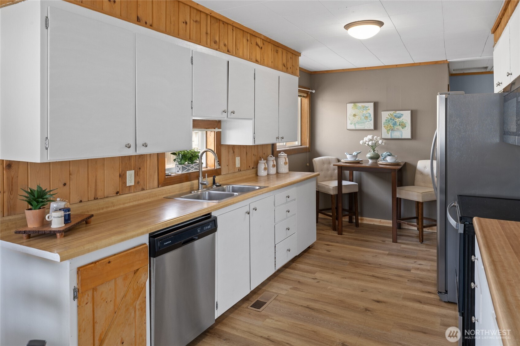 107 West 2nd Street Cle Elum, WA 98922 - Photo 11 of 39 a kitchen with a sink and cabinets