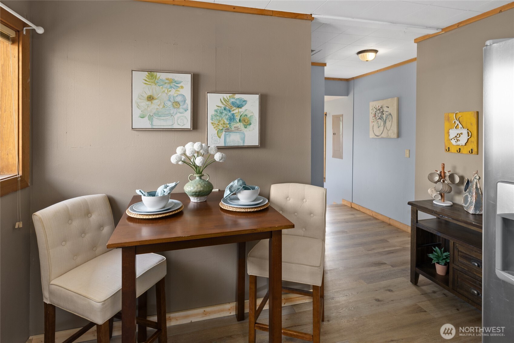 107 West 2nd Street Cle Elum, WA 98922 - Photo 13 of 39 a view of a dining room with furniture and wooden floor