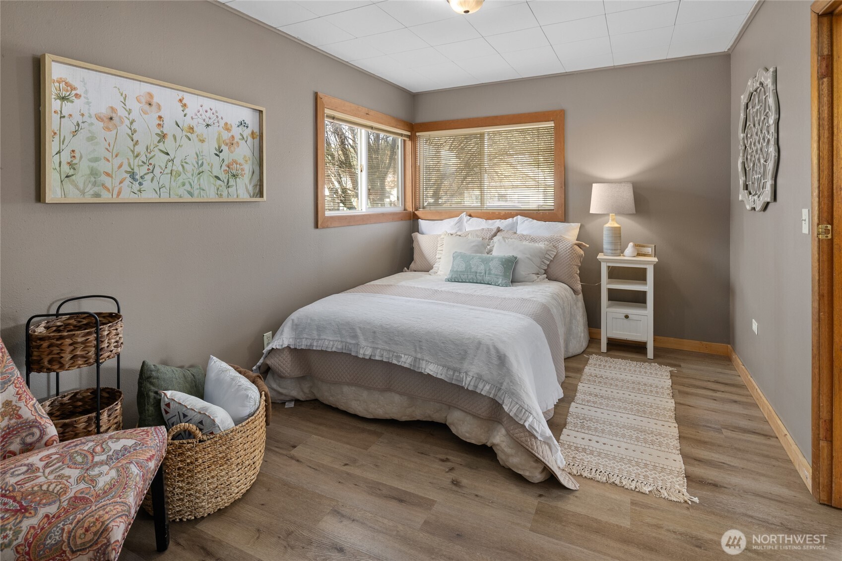 107 West 2nd Street Cle Elum, WA 98922 - Photo 17 of 39 a bedroom with a bed and wooden floor