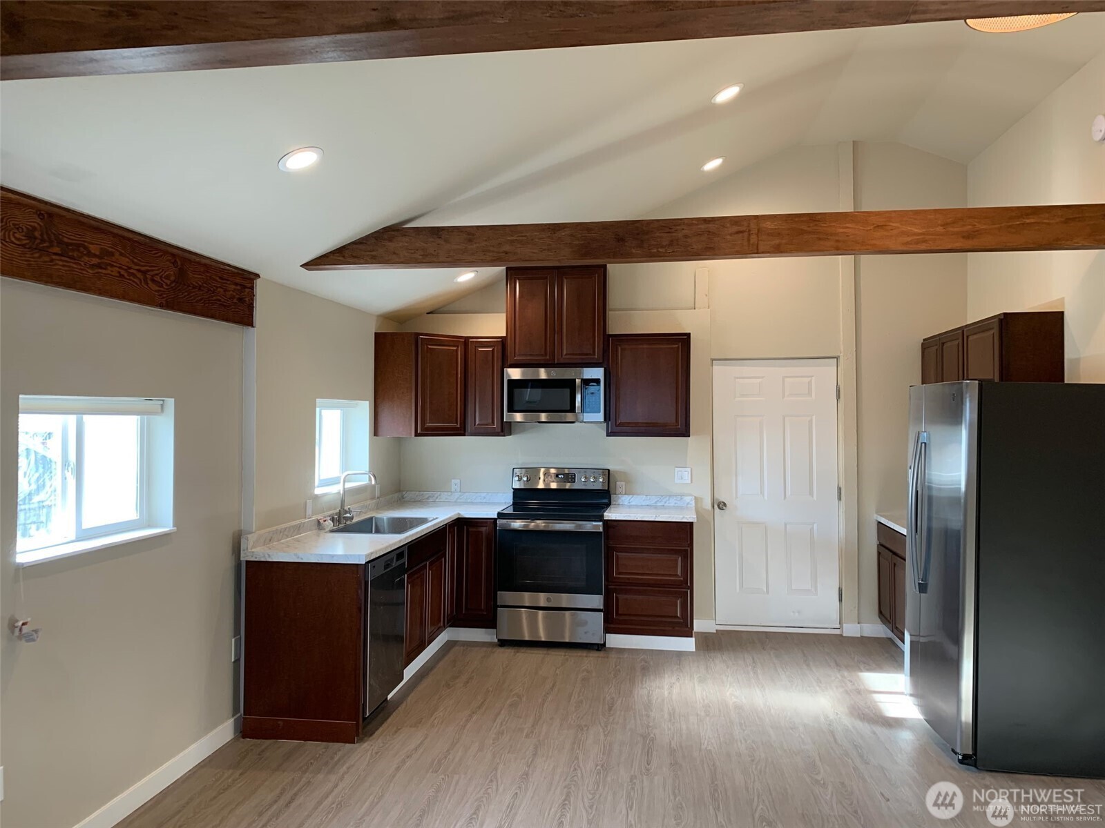 107 West 2nd Street Cle Elum, WA 98922 - Photo 25 of 39 a kitchen with stainless steel appliances granite countertop a refrigerator and a stove